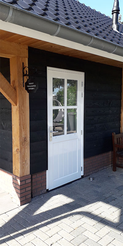 Ingang naar de praktijkruimte